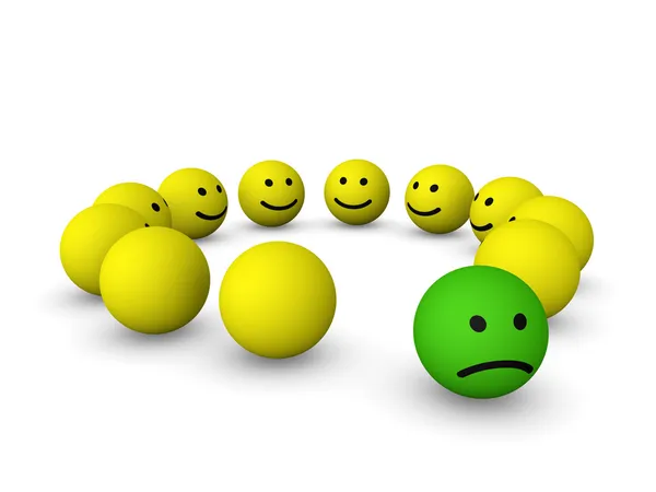 Ledsen smiley bland glada smileys — Stockfoto