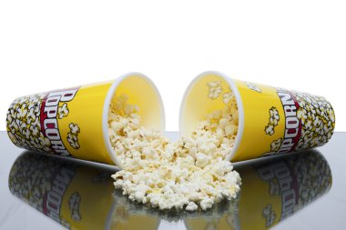 Two cups of spilled popcorn clipart