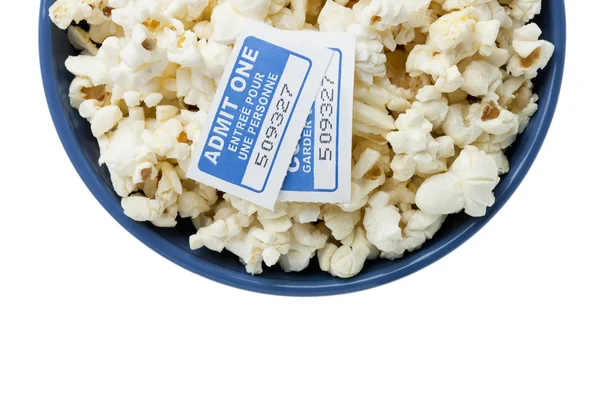 Blue bowl with popcorn and cinema tickets — Stock Photo, Image