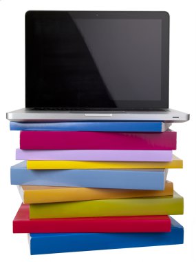 dizüstü bilgisayar ve kitap