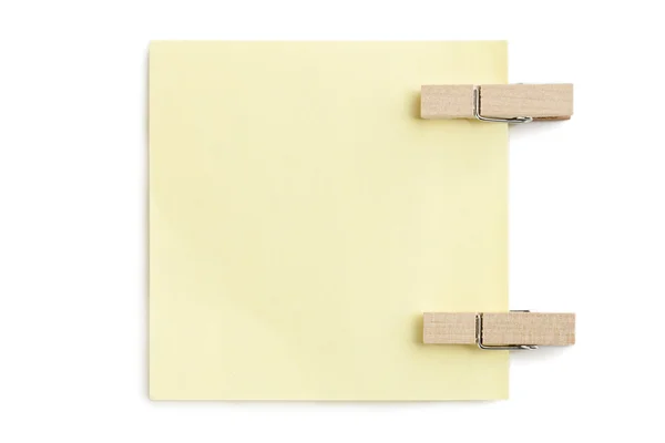 Папір з двома дерев'яними кліпсами — стокове фото