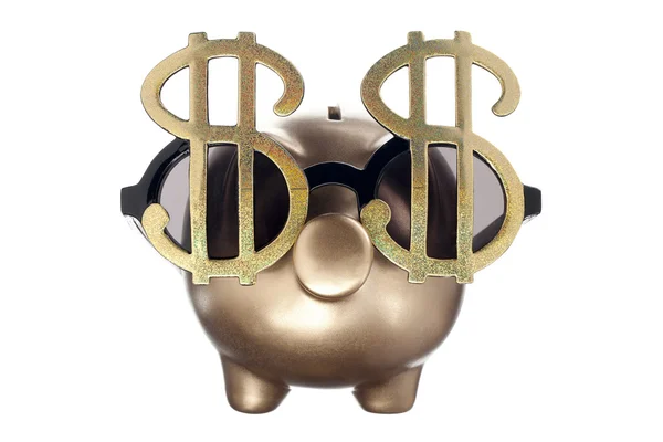 Golden piggy bank with dollar glass — Stock Photo, Image