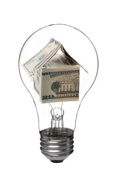 Light bulb with dollar house — Stock Photo, Image