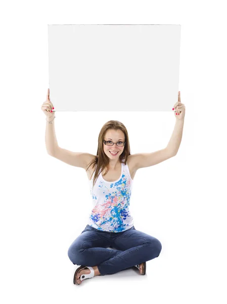 Teenage girl holding up placard — Stock Photo, Image
