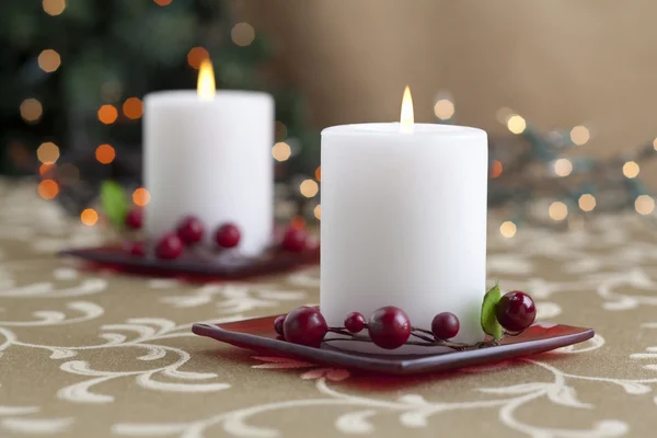 Lighted candle on the table — Stock Photo, Image