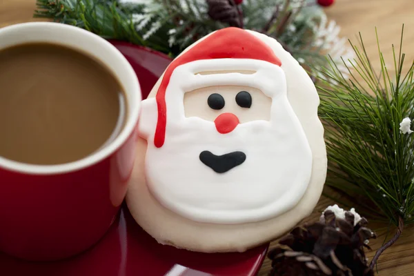 Santas cookie en een kopje koffie — Stockfoto