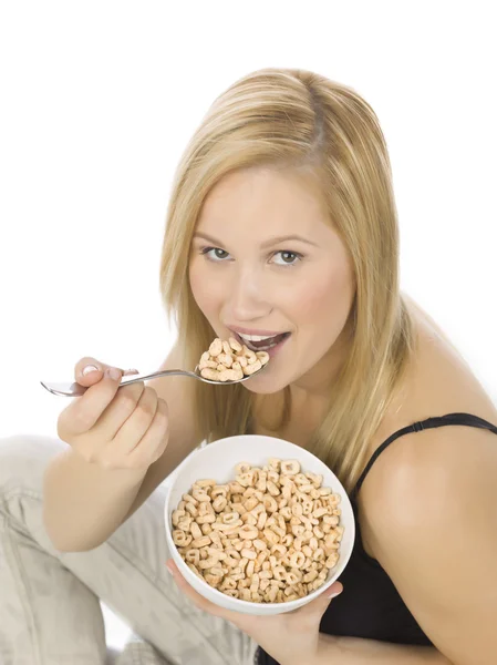 Caucasian woman eating cereals — Stock Photo, Image
