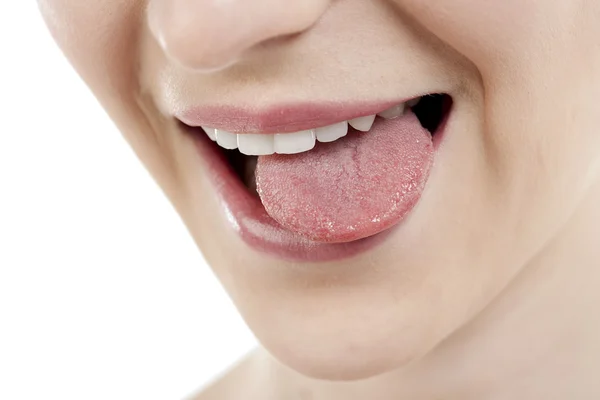 Retas kvinna med tungan ute — Stockfoto