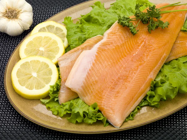 Salmon filet served in plate — Stock Photo, Image