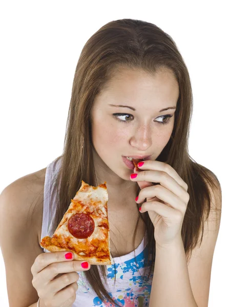 Menina adolescente pensativo comer pizza — Fotografia de Stock