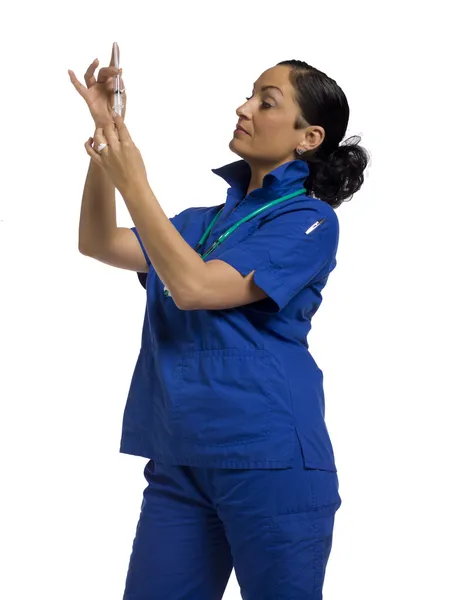 Female nurse holding a syringe — Stock Photo, Image