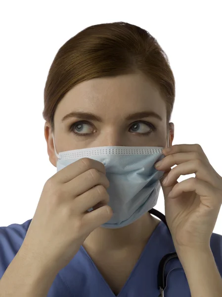 Kvinnlig sjuksköterska med mask — Stockfoto