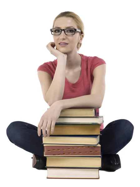 Estudante feminina com pilha de livros — Fotografia de Stock