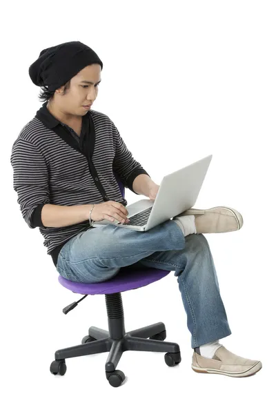 Filipino man holding a laptop — Stock Photo, Image