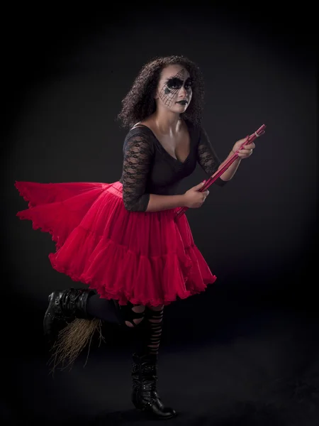 Gothic woman on a broom — Stock Photo, Image