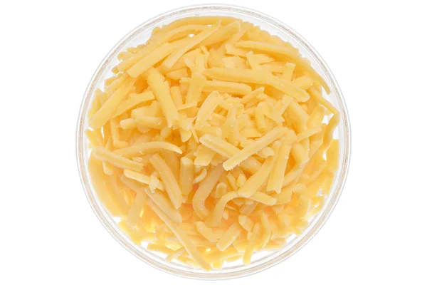 Grated cheddar cheese on bowl — Stock Photo, Image