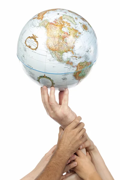Group of different hands with globe — Stock Photo, Image