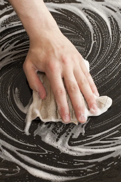 Hand cleaning a furniture — Stock Photo, Image