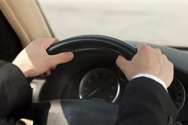 Hand on the steering wheel — Stock Photo, Image