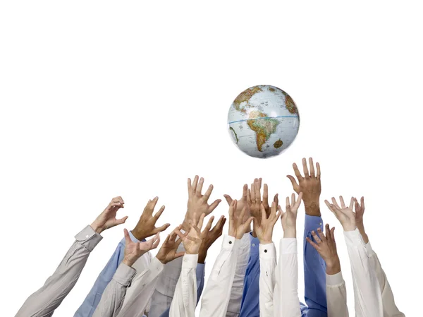 Group of hands reaching the world globe — Stock Photo, Image