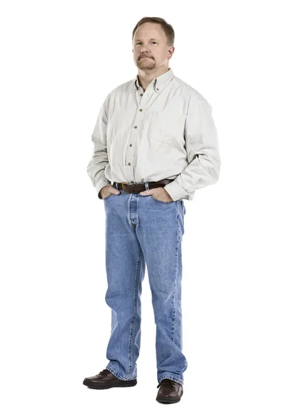 Aged man standing while hands on pocket — Stock Photo, Image