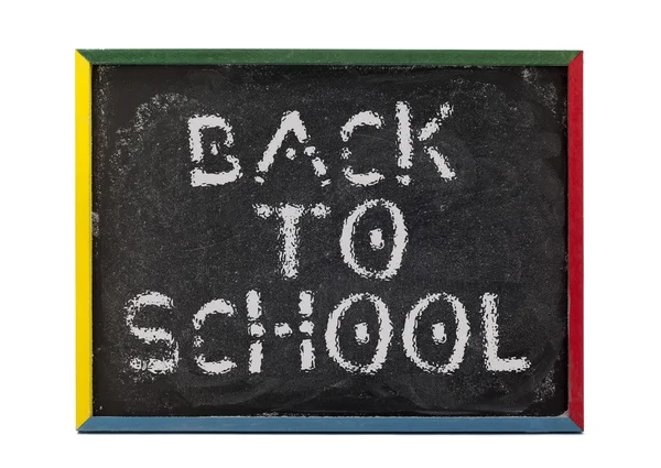 Back to school written on small students chalk board — Stock Photo, Image