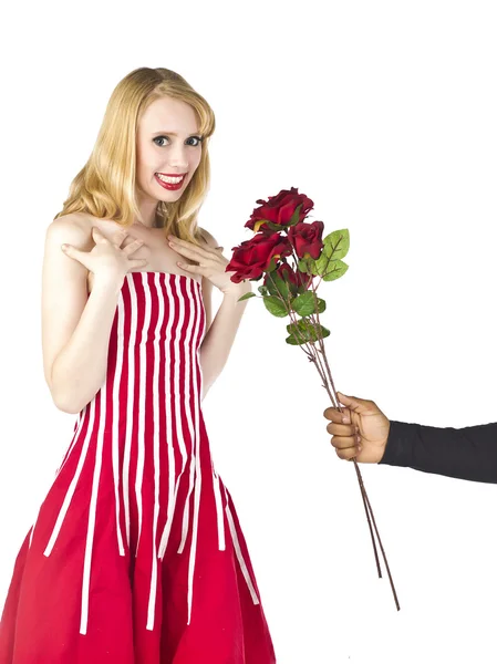 Beautiful woman receiving red roses — Stock Photo, Image