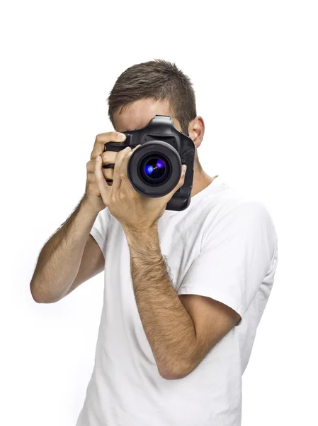 Grande macchina fotografica nasconde mans faccia — Foto Stock