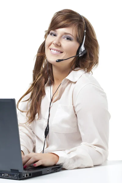 Friendly telephone operator with laptop — Stock Photo, Image