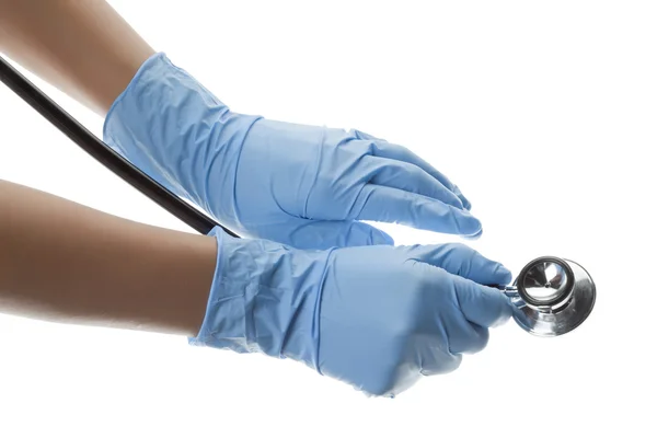 Ruce v rukavicích s stetoskop — Stock fotografie