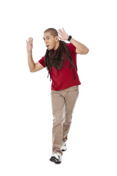 Guy walking while gesturing hand sign — Stock Photo, Image