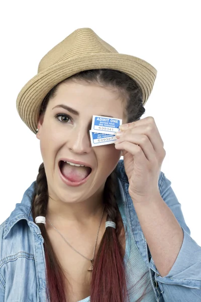 Happy young lady holding a movie tickets — Stock Photo, Image