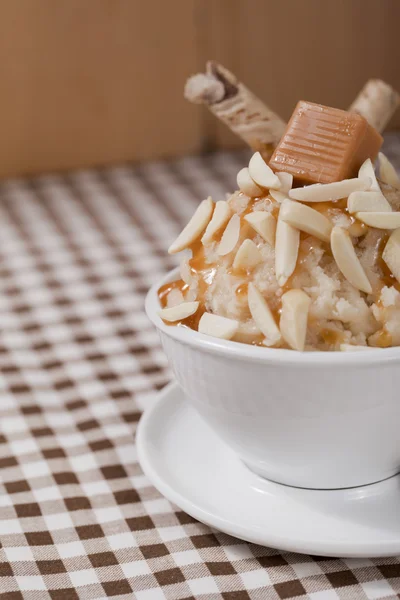 Nutty caramel ice cream closeup Royalty Free Stock Images