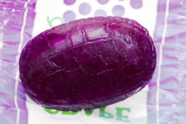 Подробное изображение фиолетовой конфеты — стоковое фото