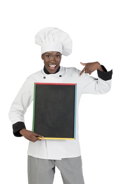 Female chef showing black board — Stock Photo, Image