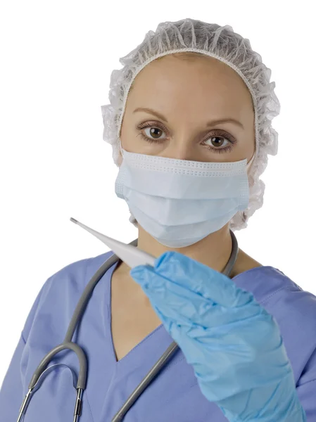 Female doctor holding a thermometer — Stock Photo, Image