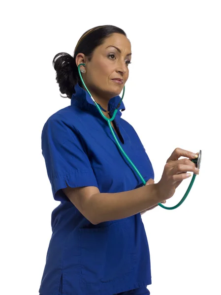 Female nurse holding her stethoscope — Stock Photo, Image