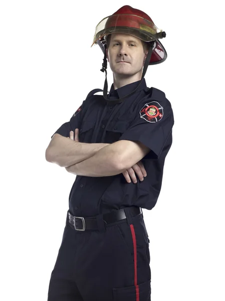 Firefighter with arm crossed — Stock Photo, Image