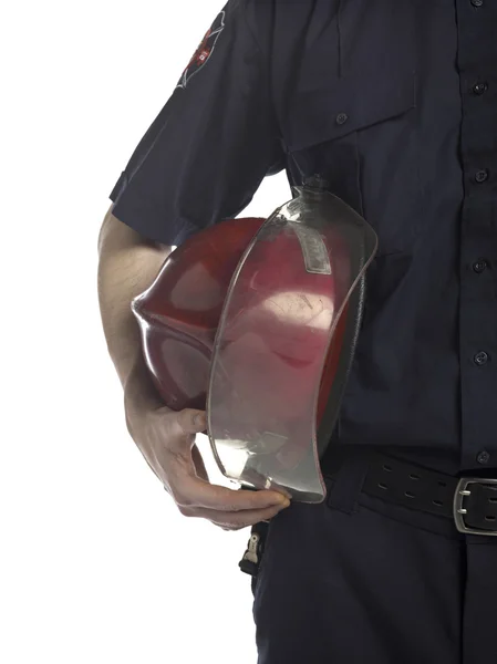 Fire fighter holding helmet — Stock Photo, Image