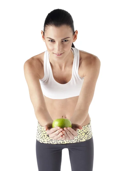 Niña sosteniendo una manzana verde — Foto de Stock