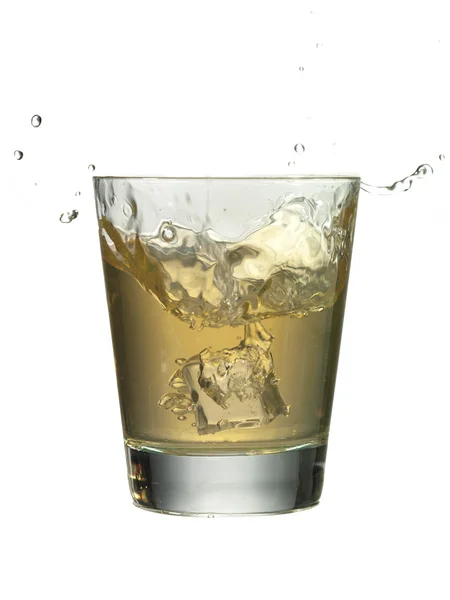 Glass of whiskey with a splash — Stock Photo, Image