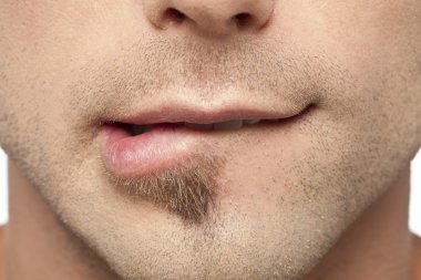 male biting his lips clipart