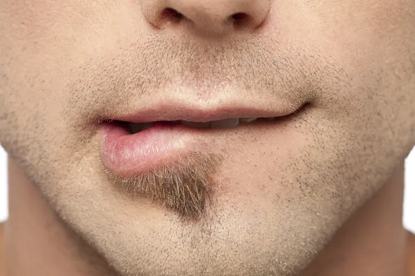 彼の唇をかむの男性 — ストック写真