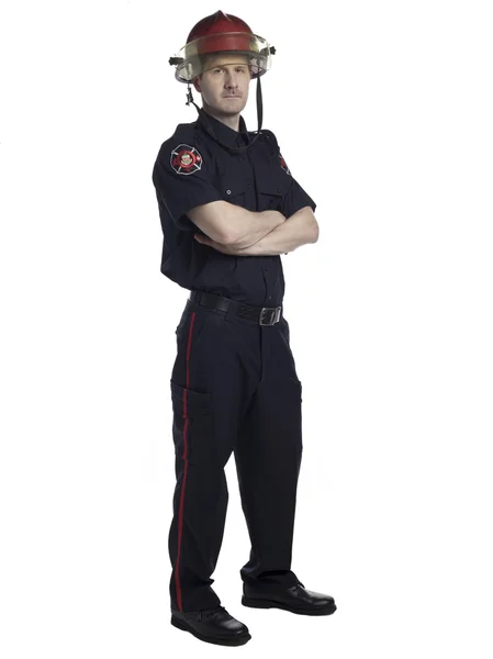 Manliga brandman med arm korsade — Stockfoto