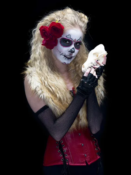 Portrait shot of a young woman wearing sugar skull make up — Stock Photo, Image