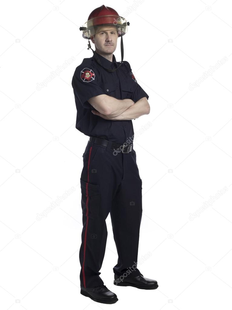 male fire fighter with arm crossed