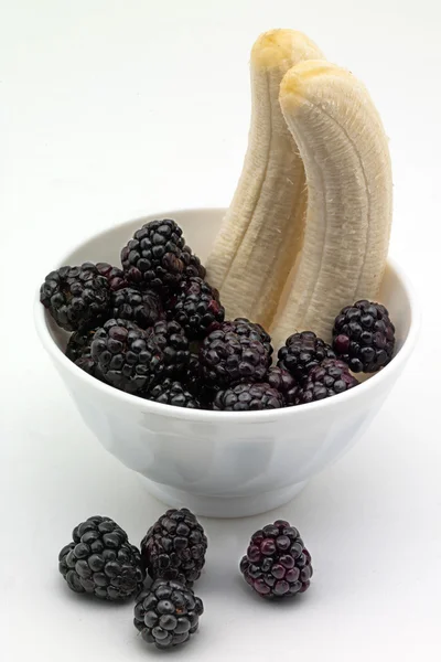 Bananas and blackberries — Stock Photo, Image