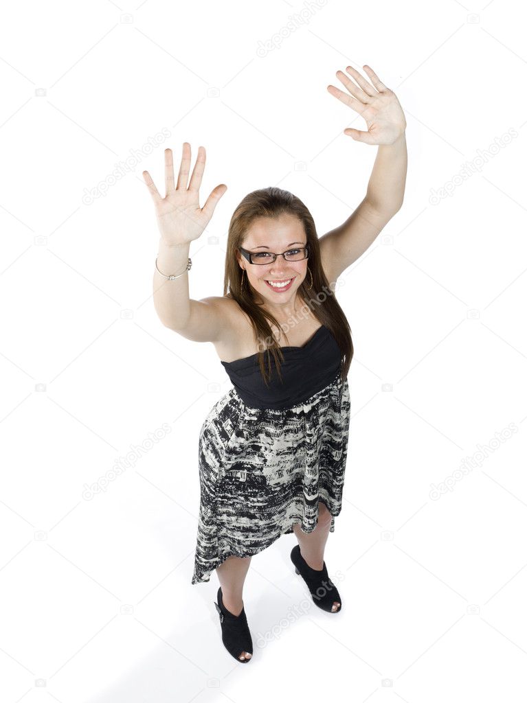 portrait of a happy teenage girl raising her hands