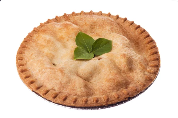 Apple pie garnished with leaves — Stock Photo, Image