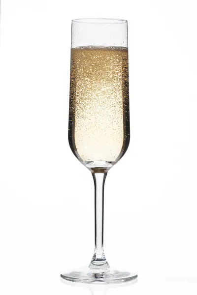 Champagne fluit vol met champagne — Stockfoto